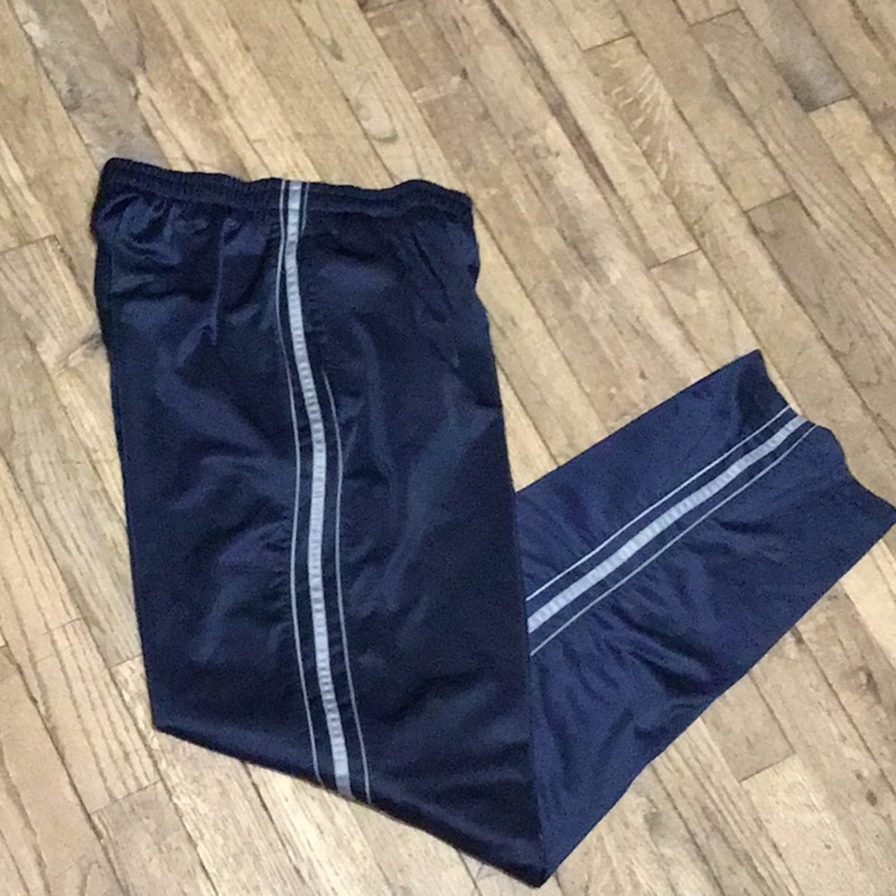 SPALDING MANS TRACK PANTS.